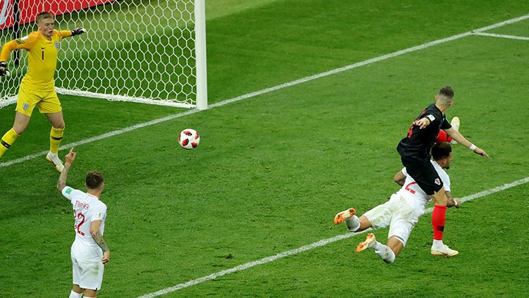 Ivan Perisic mencetak gol yang membuat Kroasia menyamakan kedudukan atas Inggris. Copyright: © INDOSPORT