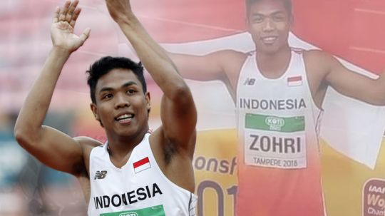 Pelari Indonesia Lalu Muhammad Zohri meluapkan kegembiraannya seusai berhasil menjadi yang tercepat pada nomor lari 100. Copyright: © INDOSPORT