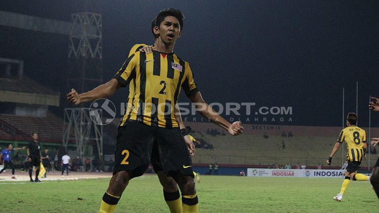 Pemain Malaysia merayakan gol usai membobol gawang Myanmar U-18. Copyright: © Fitra Herdian/INDOSPORT