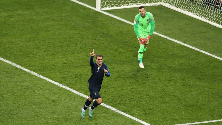 Antoine Griezmann mencetak gol melalui titik putih penalti. Copyright: © Getty Images