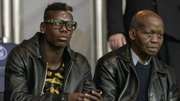 Paul Pogba dan sang ayah. Copyright: © Getty Images