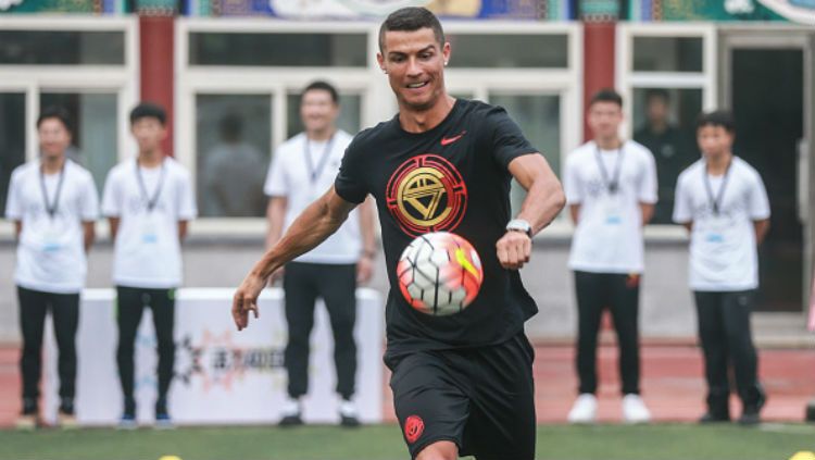 Cristiano Ronaldo datang ke China. Copyright: © Getty Images