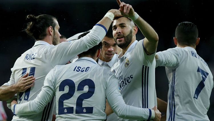Para pemain Real Madrid melakukan selebrasi. Copyright: © Getty Images