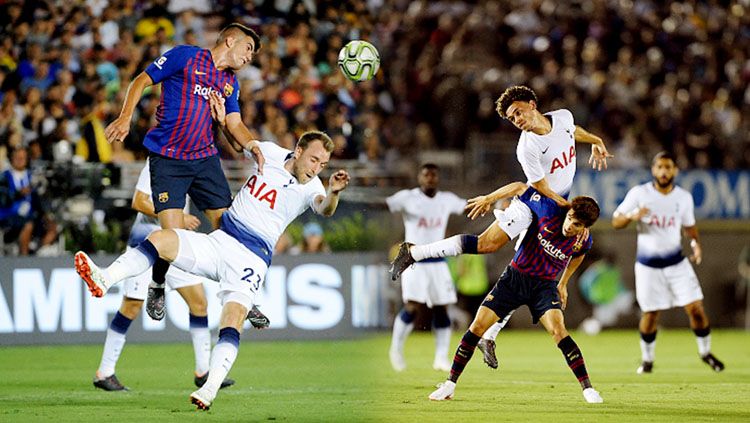 Duel udara pemain Barcelona vs Tottenham Hotspur. Copyright: © Getty Images
