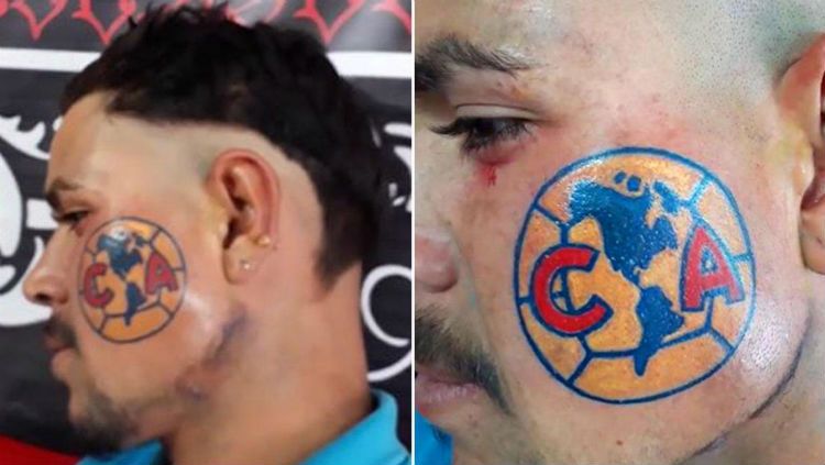 Seorang fan Club America memasang tato di wajah. Copyright: © The Sun