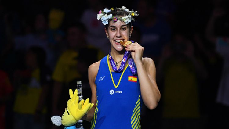 Carolina Marin saat menjadi juara dunia Badminton World Championships 2018. Setelah Lindaweni Fanetri di tahun 2012, tak ada lagi wakil Indonesia yang bisa mengalahkannya. Copyright: © JOHANNES EISELE/AFP/Getty Images