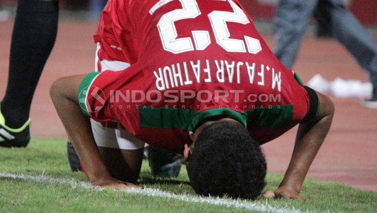 Selebrasi Fajar Fathur Rahman setelah mencetak gol pertama ke gawang Thailand di final Piala AFF U-16. Copyright: © INDOSPORT/Fitra Herdian