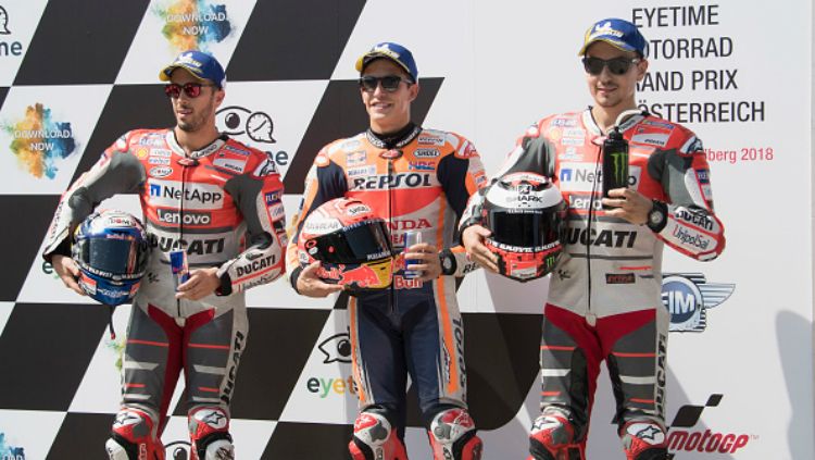 Andrea Dovizioso, Marc Marquez, dan Jorge Lorenzo usai sesi kualifikasi MotoGP Austria 2018. Copyright: © Getty Images