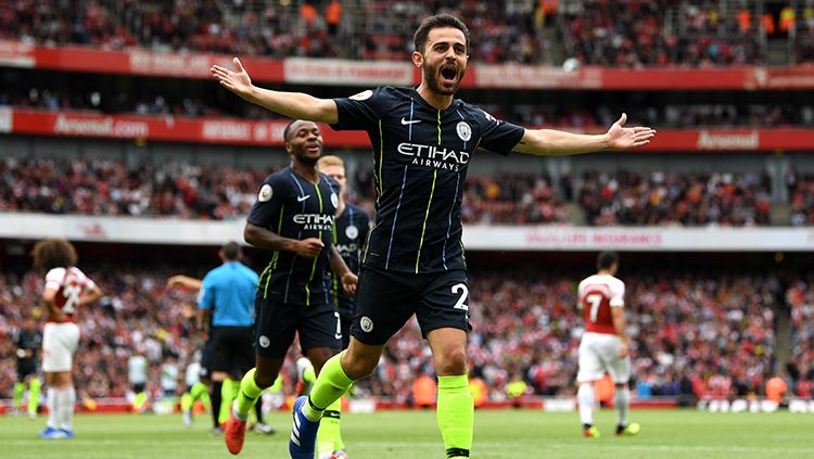 Bernardo Silva mencetak gol kedua bagi Man City saat mengalahkan Arsenal. Copyright: © Getty Images/Michael Regan