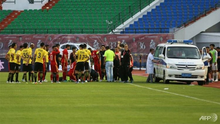 Klub Liga Super China, Wuhan Zall memutuskan kembali ke Kota Wuhan setelah virus corona menyerang Spanyol. Copyright: © AFP