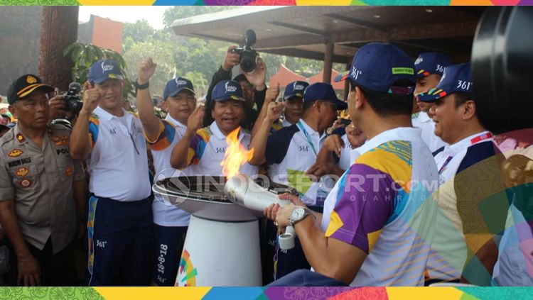 Torch relay atau pawai obor Asian Games 2018 di Jakarta dimulai hari ini. Sejumlah ruas jalan di Jakarta Timur hingga Jakarta Selatan yang dipakai untuk kegiatan tersebut ditutup sementara. Copyright: © Arif Yahya/INDOSPORT