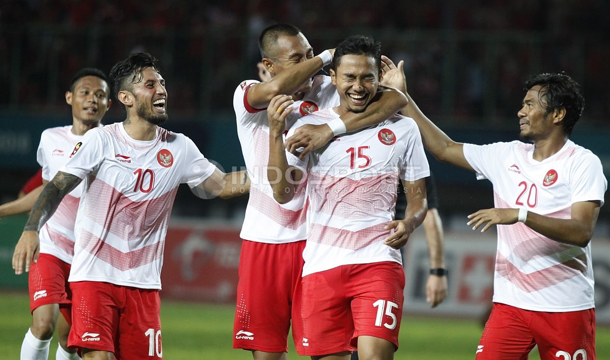 Selebrasi gol ketiga Ricky Fajrin di laga Timnas Indonesia U-23 vs Laos dalam Asian Games 2018. Copyright: © INDOSPORT/Herry Ibrahim