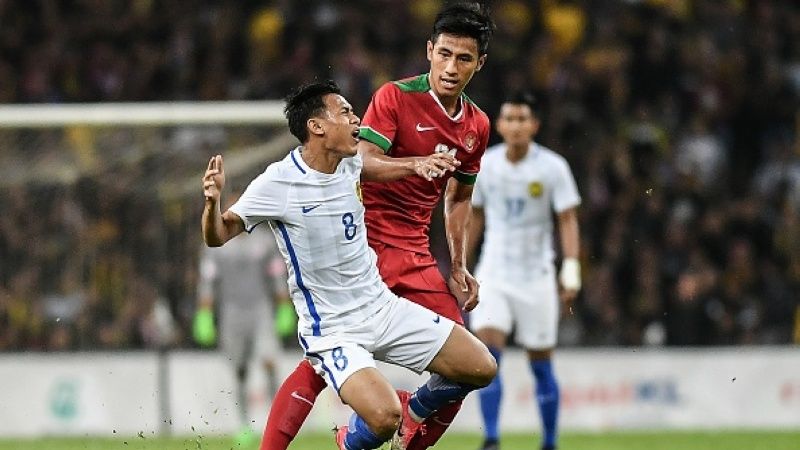 Hanif Sjahbandi saat melawan Timnas Malaysia Copyright: © Getty Images