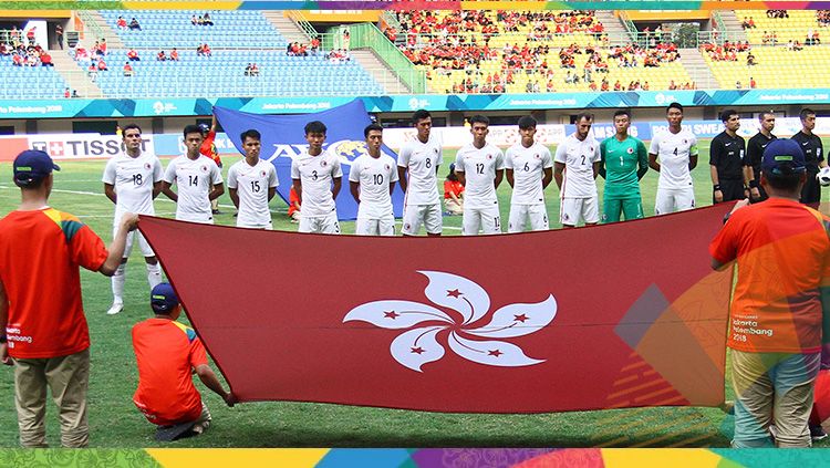 Tim sepak bola Hong Kong menyanyikan lagu kebangsaan jelang pertandingan melawan tim Palestina padak ajang Asian Games 2018. Copyright: © INASGOC