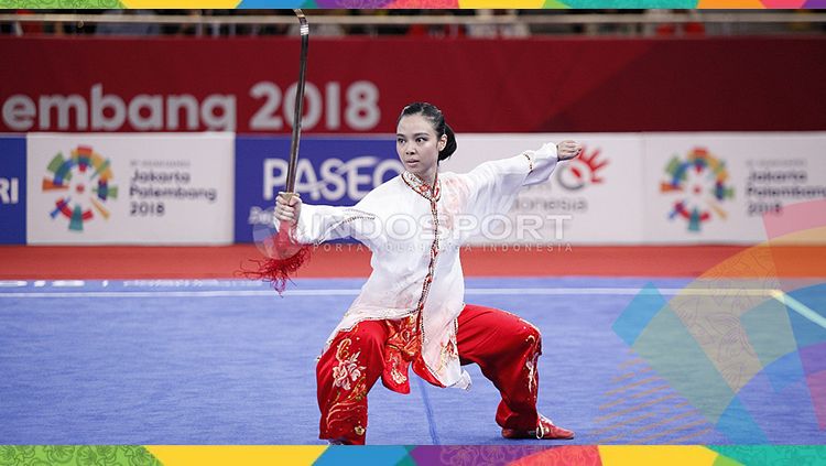 Atlet wushu Indonesia, Lindswell Kwok berhasil meraih medali emas Asian Games 2018. Copyright: © INDOSPORT/Herry Ibrahim