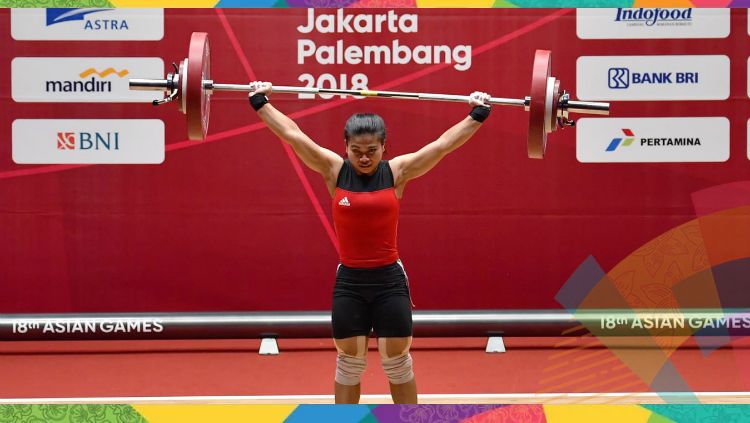 Sri Wahyuni, atlet angkat besi kebangaan Indonesia, resmi menjadi ibu. INASGOC/Fanny Octavianus/YU/18. Copyright: © INASGOC/Fanny Octavianus/YU/18