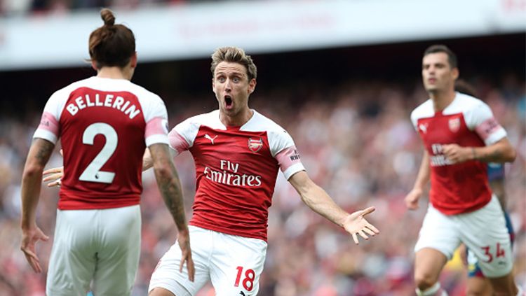 Skuat Arsenal merayakan gol ke gawang West Ham United di pekan ketigaa Liga Inggris. Copyright: © Getty Images