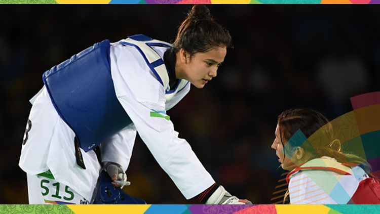 Atlet taekwondo, Nigora Tursunkulova (kiri) Copyright: © Getty Images/KIRILL KUDRYAVTSEV