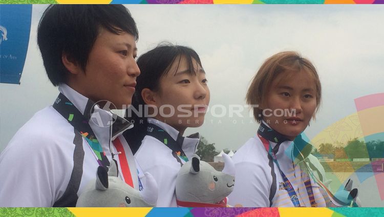 Korea Unified atau tim Korea Bersatu memastikan medali emas Asian Games 2018 perdananya lewat cabor kano. Copyright: © Lanjar Wiratri/INDOSPORT
