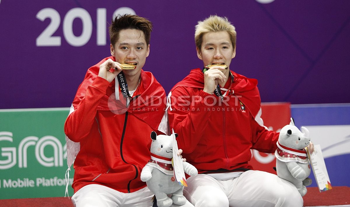 Kevin Sanjaya/Markus Fernaldi Gideon sabet medali emas cabor bulutangkis ganda putra Asian Games 2018. Copyright: © Herry Ibrahim/INDOSPORT