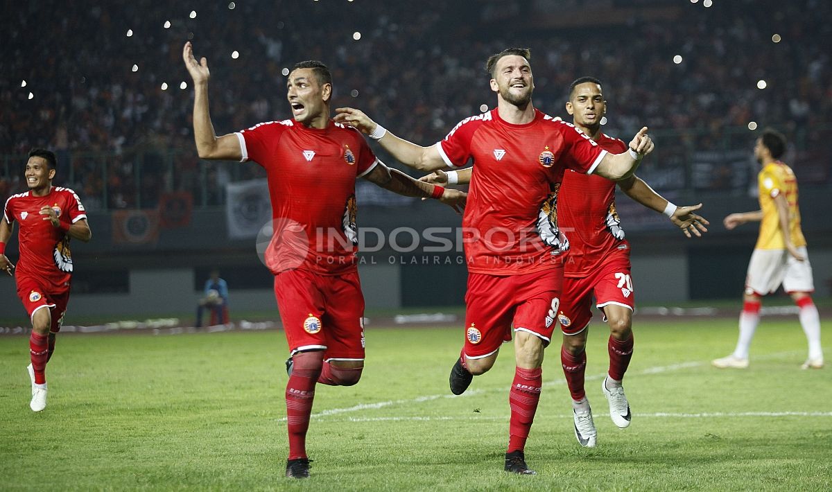 Selebrasi para pemain Persija usai cetak gol ke gawang Selangor FA. Copyright: © INDOSPORT/Herry Ibrahim