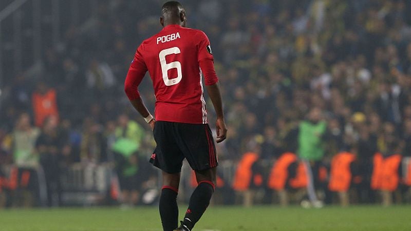 Pemain Manchester United, Paul Pogba, diyakini tidak akan meninggalkan Manchester United meski raksasa Liga Inggris itu sudah merekrut Donny van de Beek. Copyright: © Getty Images