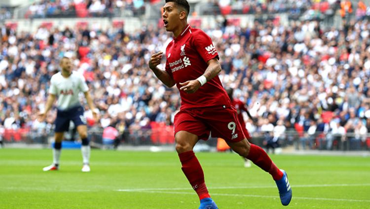 Roberto Firmino saat melawan Tottenham Hotspur. Copyright: © Getty Images