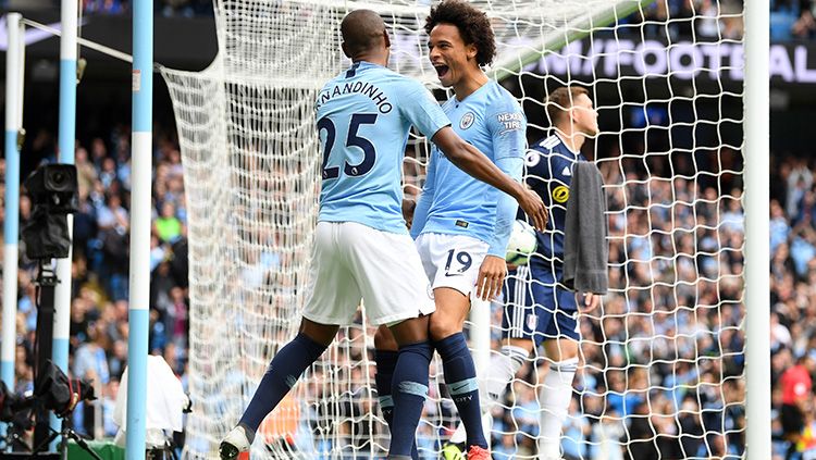 Leroy Sane berselebrasi usai mencetak gol ke gawang Fulham. Copyright: © Getty Images/Michael Regan