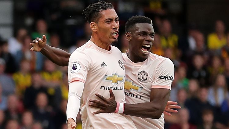 Chris Smalling berselebrasi usai menggandakan keunggulan Manchester United atas Watford. Copyright: © Getty Images/Richard Heathcote