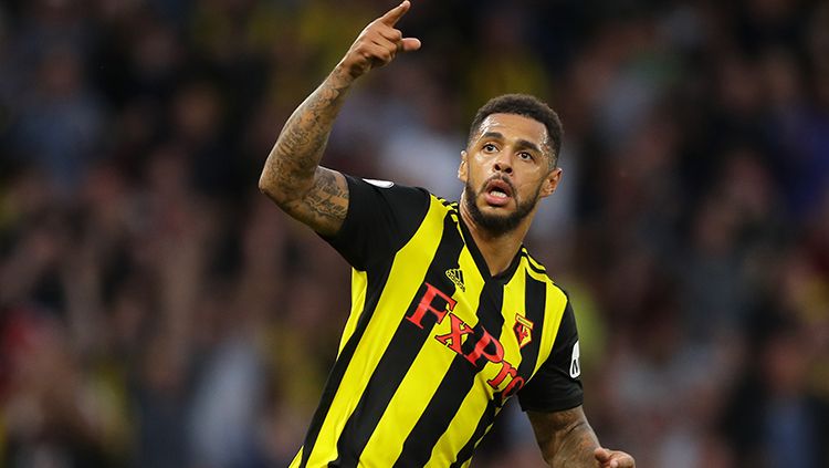 Andre Gray mencetak gol untuk memperkecil ketertinggalan Watford dari Man United. Copyright: © Getty Images/Richard Heathcote