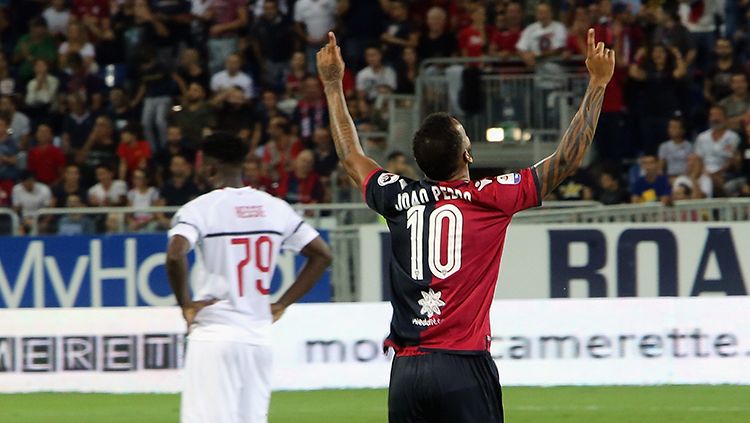 Joao Pedro berselebrasi usai mencetak gol ke gawang AC Milan. Copyright: © Getty Images/Enrico Locci