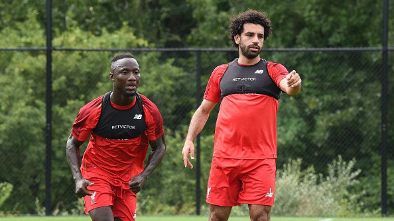 Sadio Mane dan Mohamed Salah, dua pemain bintang Liverpool. Copyright: © Getty Images