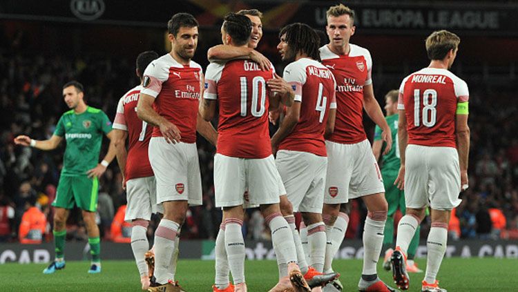 Selebrasi para pemain Arsenal. Copyright: © INDOSPORT