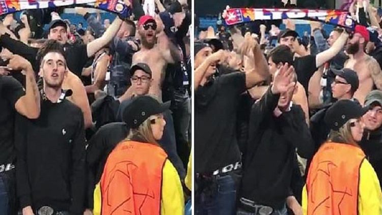 Fans Lyon yang melakukan pose salam Nazi Copyright: © The Sun