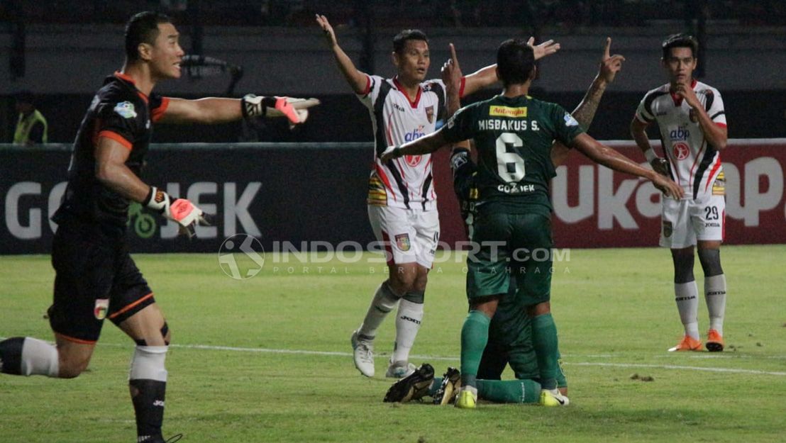 Selebrasi gol kedua david da silva lewat tendangan pinalti. Copyright: © Fitra Herdian/Football265.com