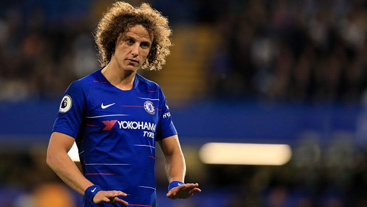 David Luiz, bek tengah Chelsea sampai mogok latihan hanya demi bergabung dengan klub rival, Arsenal. Copyright: © Getty Images