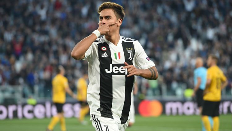 Paulo Dybala melakukan selebrasi di laga Juventus vs Young Boys. Copyright: © Getty Images