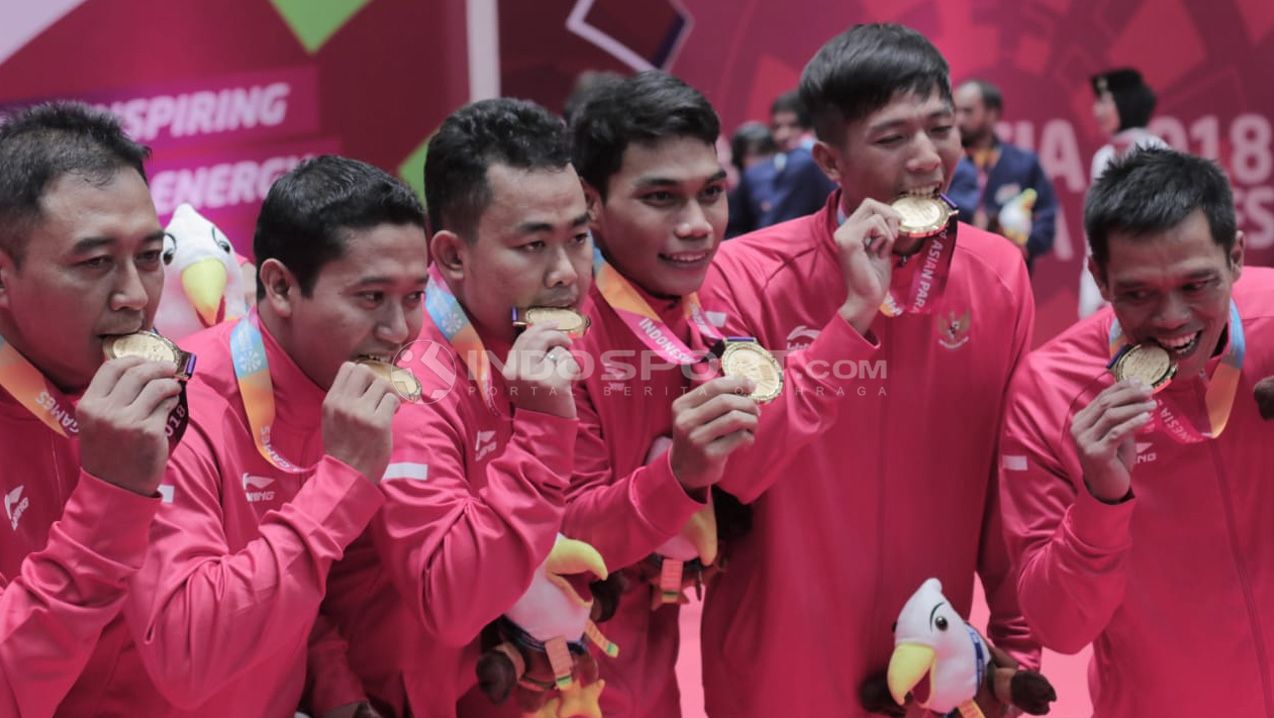 Perolehan Medali Emas, final beregu bulutangkis Indonesia vs Malaysia Asian Para Games 2018. Copyright: © Roihan Susilo Utomo/Indosport.com