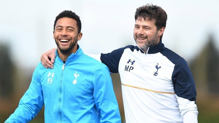 Mousa Dembele bersama Mauricio Pochettino. Copyright: © Getty Images