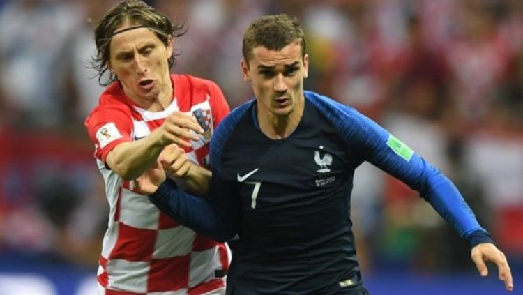 Luka Modric dan Antoine Griezmann di Piala Dunia 2018 Copyright: © Mirror