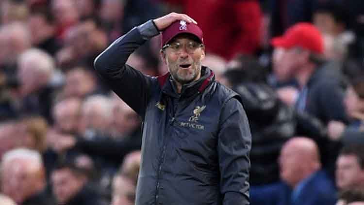 Jurgen Klopp, pelatih Liverpool dapat hadiah tak terduga ketika menyebut kekalahan timnya di Liga Champions kontra Real Madrid efek stadion yang kurang layak. Copyright: © INDOSPORT