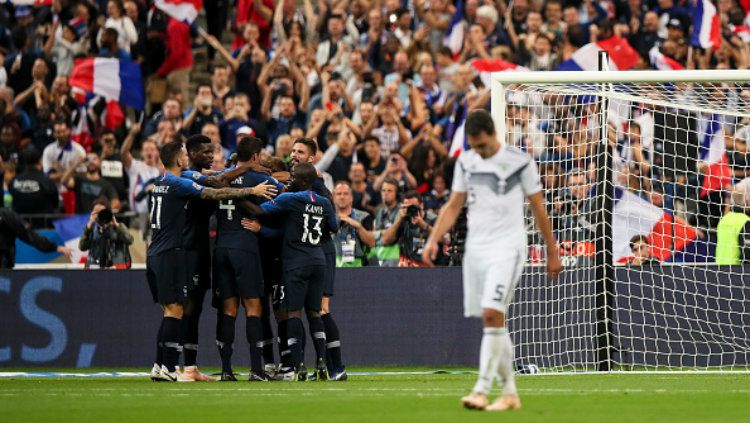 Selebrasi para pemain Prancis usai gol Antoine Griezmann. Copyright: © Getty Images