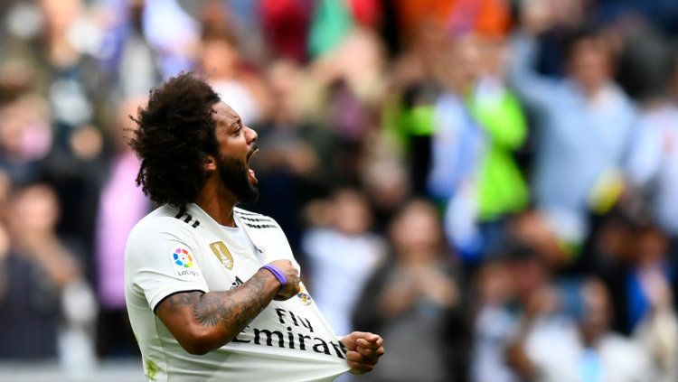 Marcelo merayakan gol saat laga Real Madrid vs Levante di La Liga Spanyol, Sabtu (20/10/18). Copyright: © Getty Images