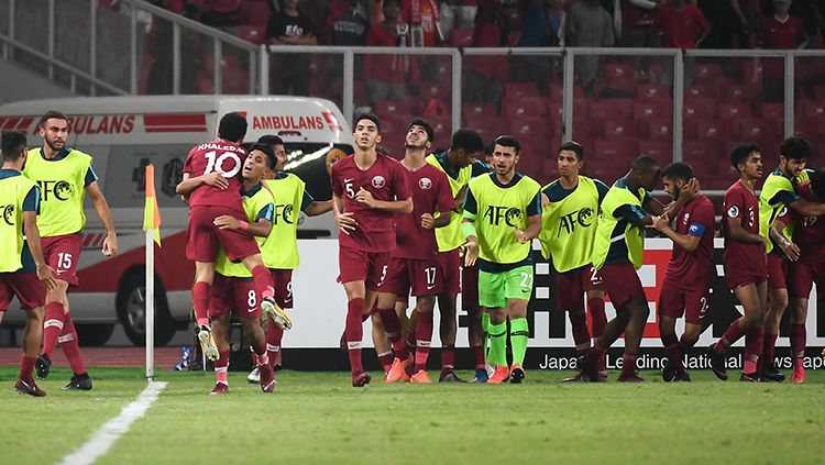 Para pemain Timnas Qatar U-19 merayakan gol saat melawan Timnas Indonesia. Copyright: © AFC
