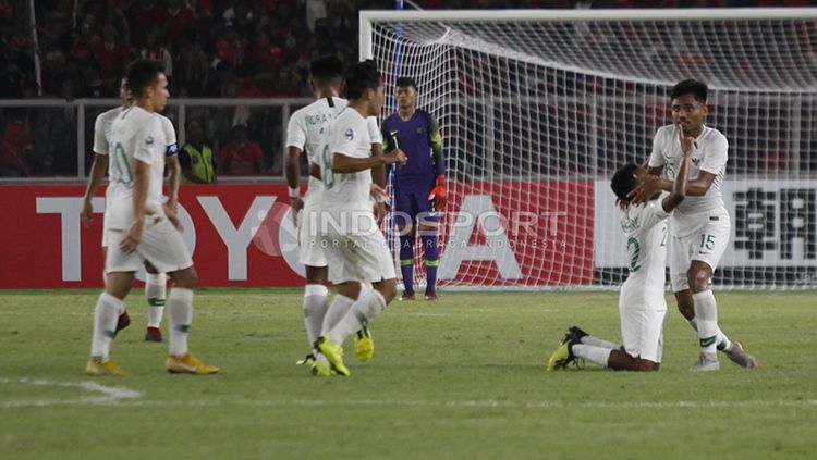 Todd Rivaldo Ferre saat berselebrasi usai mencetak gol ke gawang Qatar U-19. Copyright: © Herry Ibrahim/INDOSPORT