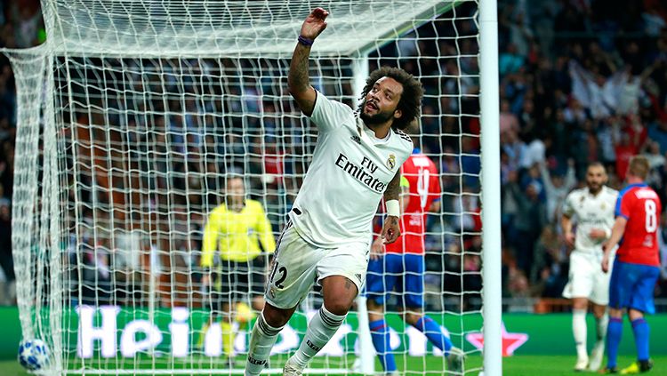 Marcelo berselebrasi usai mencetak gol ke gawang Viktoria Plzen. Copyright: © Gonzalo Arroyo Moreno/Getty Images
