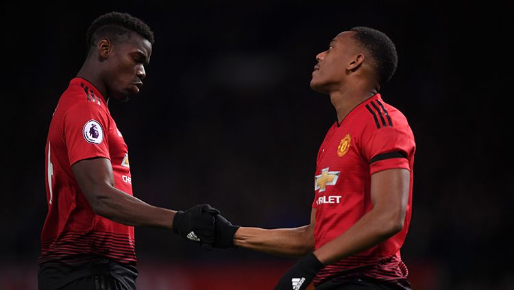 Anthony Martial merayakan gol bersama Paul Pogba. Copyright: © Getty Images/Laurence Griffiths