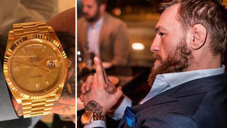 Conor Mcgregor memamerkan jam tangan Rolex emas pada sidang UFC Copyright: © Sun Sport