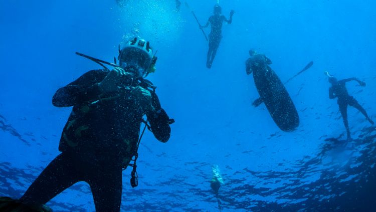 Ilustrasi menyelam atau scuba diving. Copyright: © GETTYIMAGES