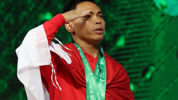 Eko Yuli juara dunia kejuaraan angkat besi di China. Copyright: © IWF.com